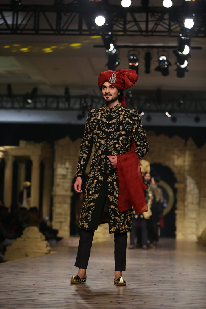 BLACK AND GOLD EMBROIDERED SHERWANI WITH CRIMSON ACCENTS RUNWAY S